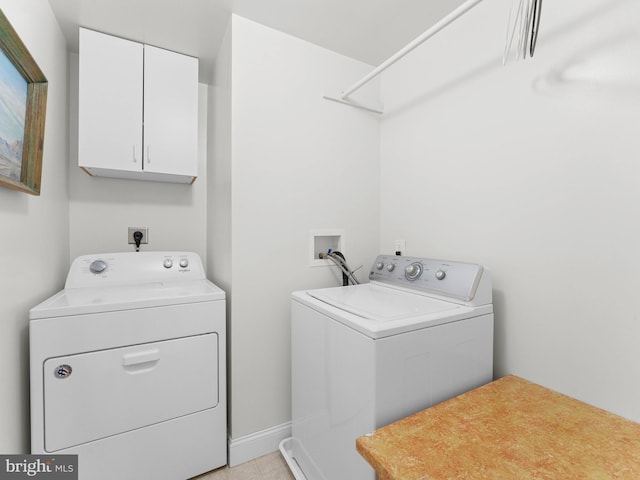 600 Maplewood Rd, Springfield, PA 19064 - laundry area featuring baseboards, cabinet space, and washing machine and clothes dryer