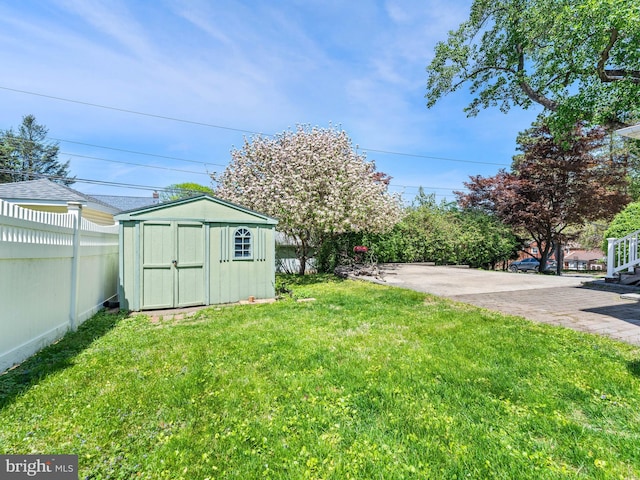600 Maplewood Rd, Springfield, PA 19064 - view of yard with fence, an outdoor structure, and a storage unit