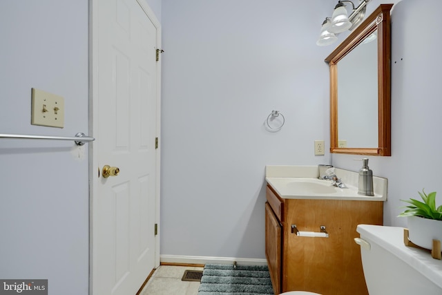 365 Hickory Trl, Crownsville, MD 21032 - half bath with vanity, baseboards, visible vents, and toilet