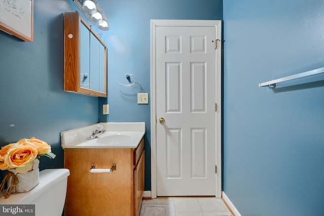 365 Hickory Trl, Crownsville, MD 21032 - bathroom with toilet, vanity, baseboards, and tile patterned flooring