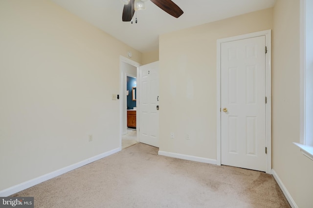 365 Hickory Trl, Crownsville, MD 21032 - unfurnished bedroom featuring carpet floors, baseboards, and a ceiling fan