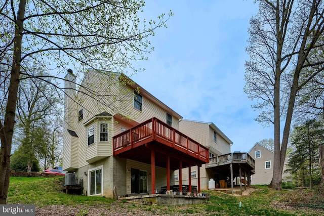 365 Hickory Trl, Crownsville, MD 21032 - rear view of property featuring a chimney, a deck, and brick siding