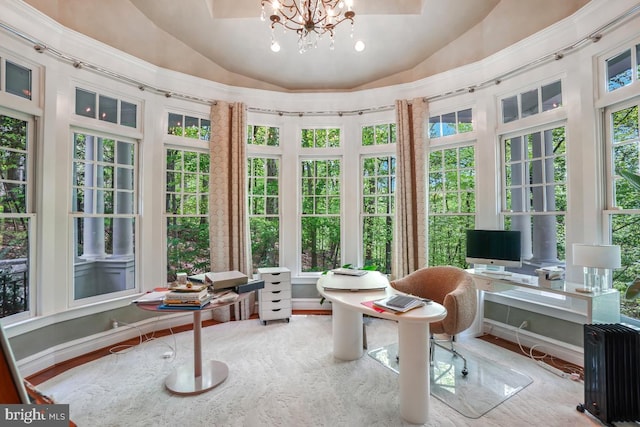 sunroom with french doors, radiator heating unit, a healthy amount of sunlight, and lofted ceiling