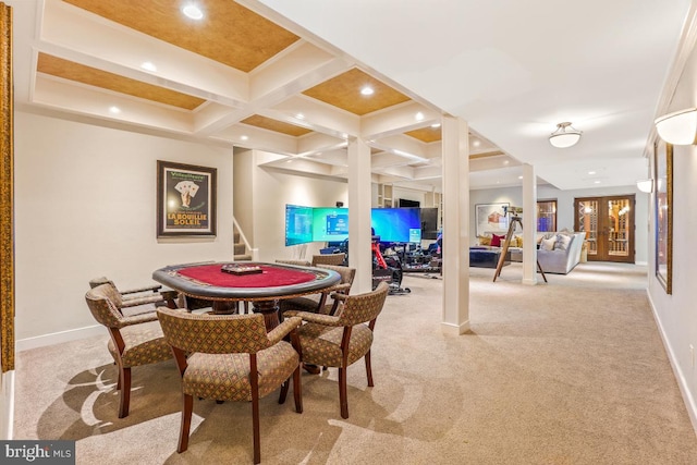 game room featuring baseboards, coffered ceiling, beam ceiling, and light carpet