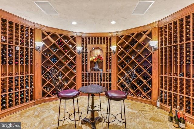 wine area featuring recessed lighting