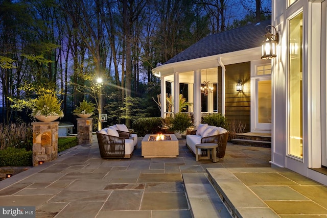 view of patio / terrace featuring a fire pit