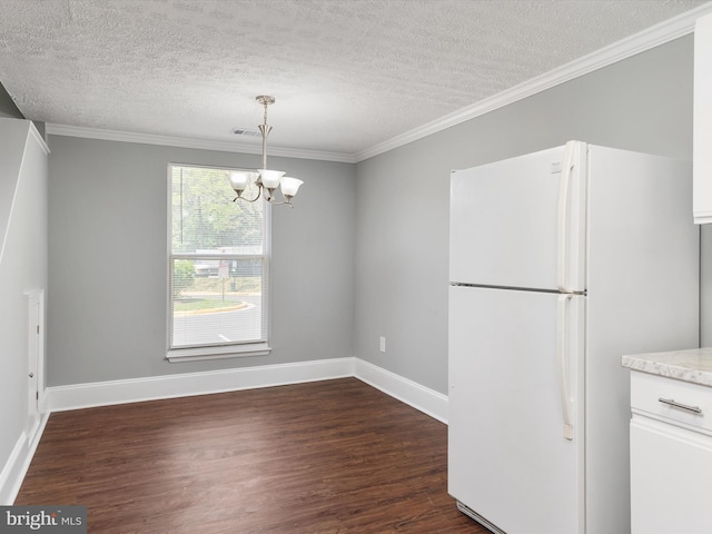 13347 Demetrias Way W, Germantown, MD 20874 - unfurnished dining area with crown molding, dark wood-style flooring, a textured ceiling, and a chandelier