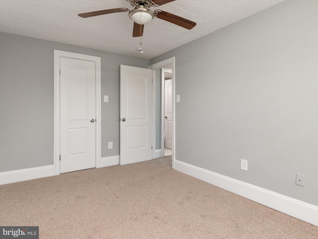 13347 Demetrias Way W, Germantown, MD 20874 - unfurnished bedroom with baseboards, carpet, a ceiling fan, and a textured ceiling