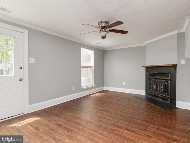 13347 Demetrias Way W, Germantown, MD 20874 - unfurnished living room featuring visible vents, a wood stove, plenty of natural light, and wood finished floors