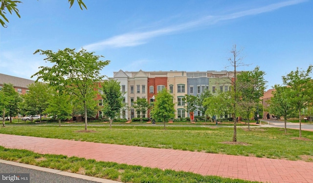 surrounding community with a yard