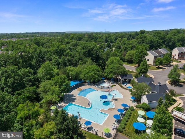 22034 Stone Hollow Dr, Broadlands, VA 20148 - aerial view of a heavily wooded area and a pool