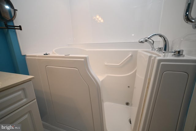 full bathroom with a tub