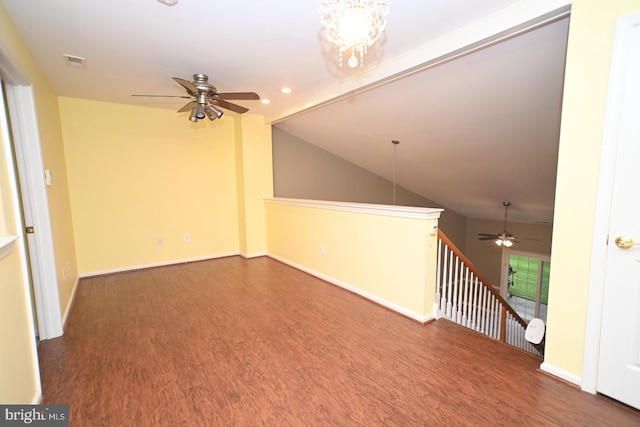 unfurnished room featuring visible vents, a ceiling fan, and wood finished floors