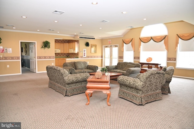 living room featuring light colored carpet, visible vents, and recessed lighting