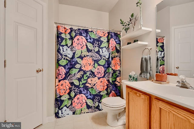 full bath featuring vanity, tile patterned flooring, toilet, and a shower with curtain