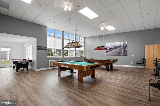 rec room featuring a healthy amount of sunlight, baseboards, wood finished floors, and pool table