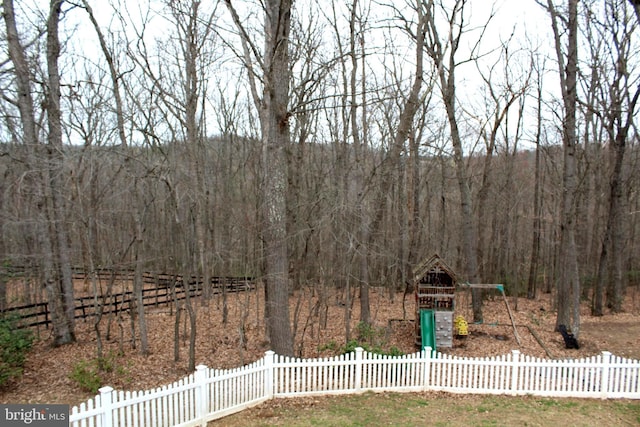 6 Copewood Ct, Manchester, MD 21102 - view of yard with a forest view, fence, and a playground