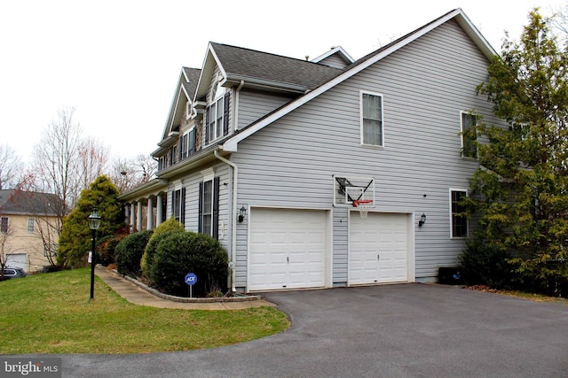 6 Copewood Ct, Manchester, MD 21102 - view of home's exterior featuring a garage, aphalt driveway, roof with shingles, and a yard
