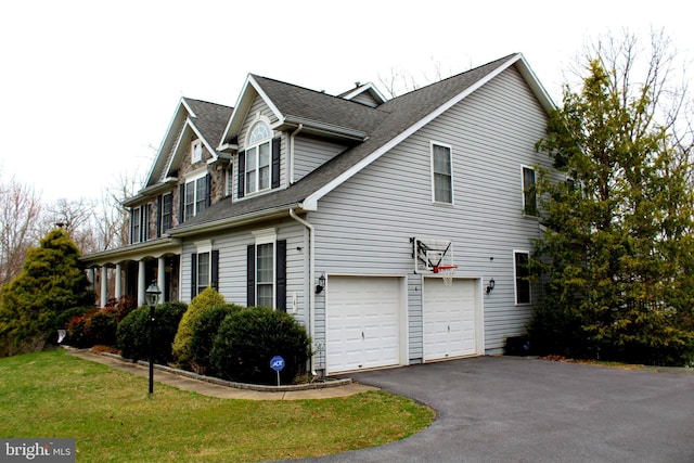6 Copewood Ct, Manchester, MD 21102 - view of side of property with roof with shingles, a garage, aphalt driveway, and a lawn
