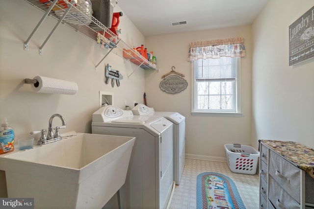 6 Copewood Ct, Manchester, MD 21102 - laundry area featuring laundry area, light floors, visible vents, a sink, and washer and dryer