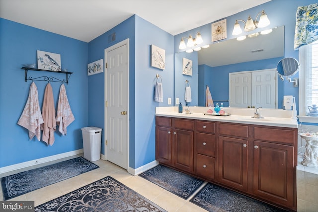 6 Copewood Ct, Manchester, MD 21102 - full bath featuring a sink, visible vents, tile patterned floors, and double vanity