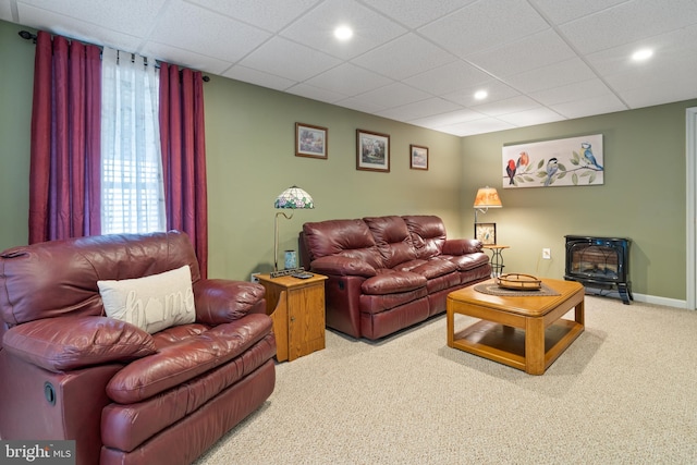 6 Copewood Ct, Manchester, MD 21102 - carpeted living room featuring a wood stove, baseboards, a drop ceiling, and recessed lighting