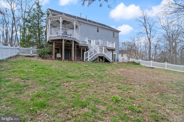 6 Copewood Ct, Manchester, MD 21102 - back of house with stairway, a fenced backyard, a wooden deck, and a lawn