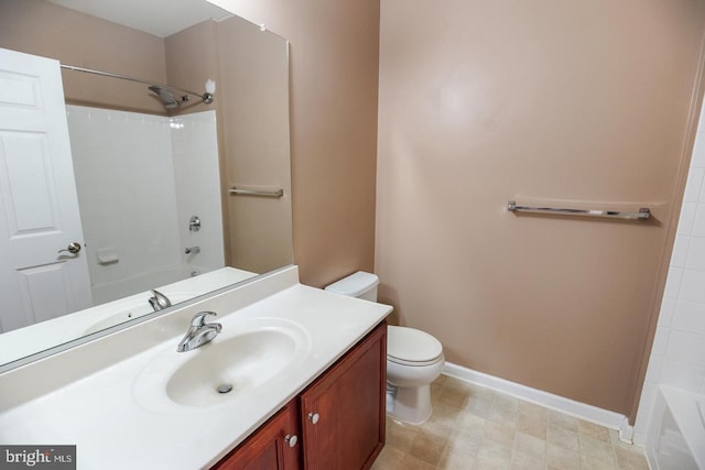 1341 Karen Blvd Unit 404, Capitol Heights, MD 20743 - bathroom with toilet, vanity, baseboards, and bathing tub / shower combination