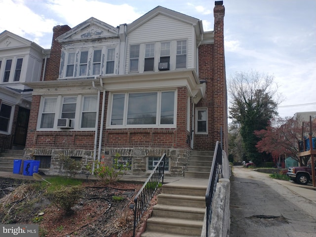 6812 Sprague St, Philadelphia, PA 19119 - multi unit property featuring brick siding, cooling unit, and a chimney