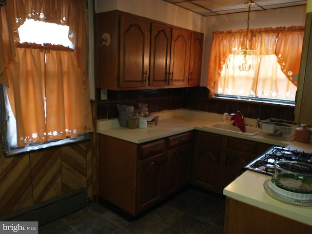 6812 Sprague St, Philadelphia, PA 19119 - kitchen featuring a wealth of natural light, light countertops, a sink, and hanging light fixtures