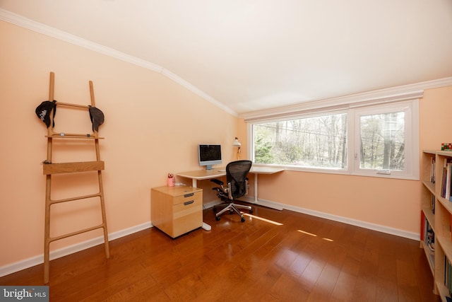 office featuring ornamental molding, baseboards, wood finished floors, and lofted ceiling