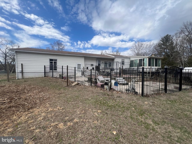 back of house featuring a patio and fence