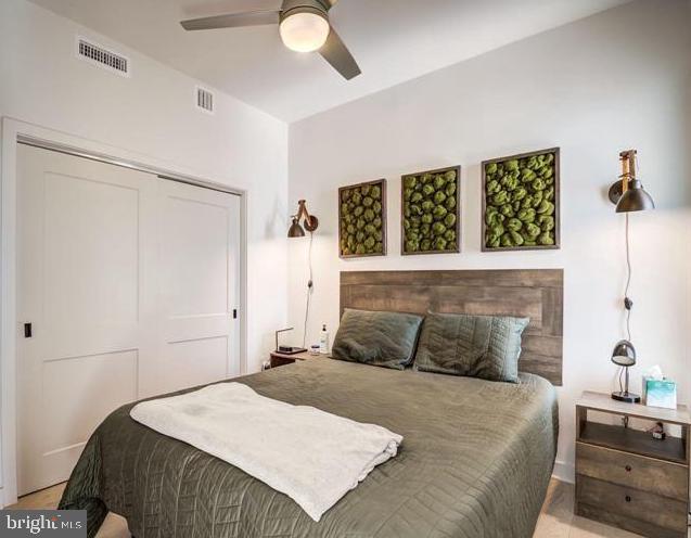 bedroom with a closet and ceiling fan