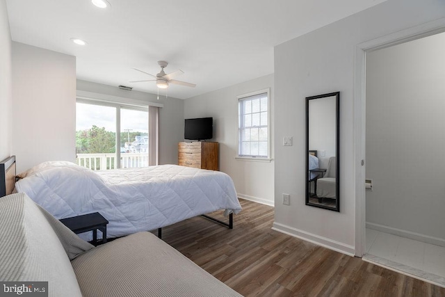 10429 Brighton Rd, Ocean City, MD 21842 - bedroom with wood finished floors, multiple windows, baseboards, recessed lighting, and access to outside