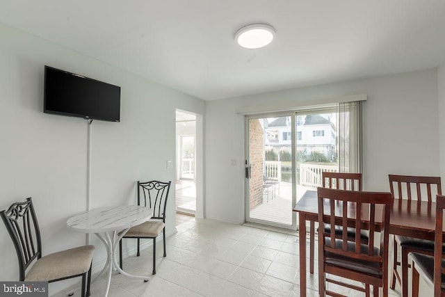 10429 Brighton Rd, Ocean City, MD 21842 - dining room featuring light tile patterned floors