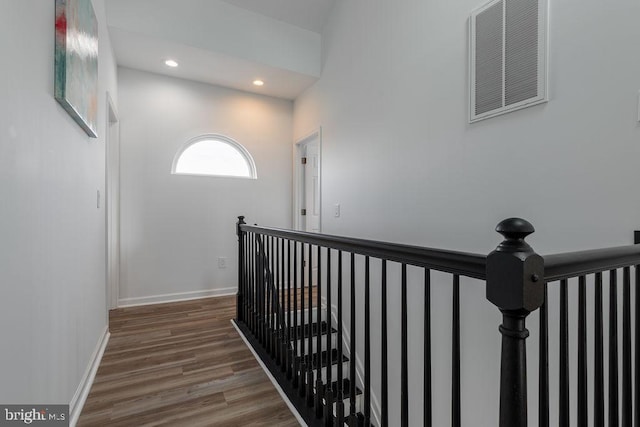 10429 Brighton Rd, Ocean City, MD 21842 - staircase featuring wood finished floors, baseboards, and recessed lighting