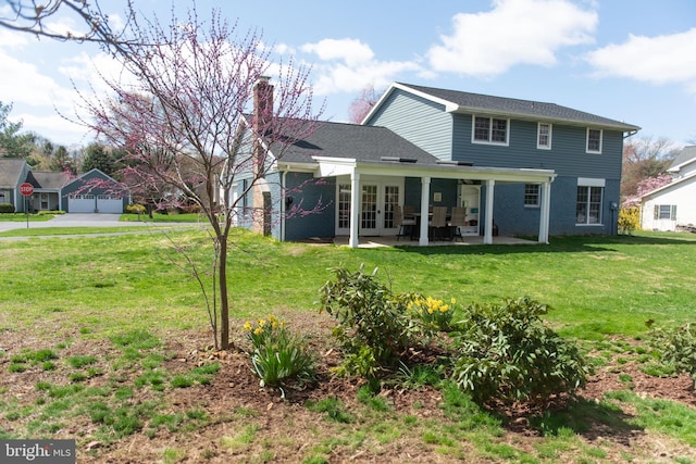 768 Lexington Ave, Hershey, PA 17033 - rear view of house with french doors, a chimney, a yard, and a patio area
