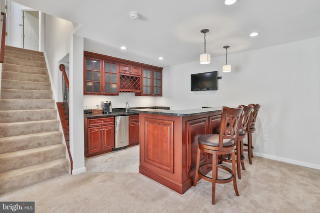 bar with indoor wet bar, recessed lighting, light carpet, and stairway