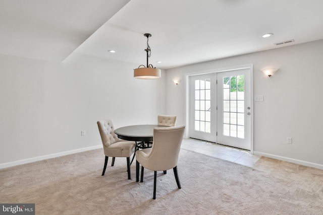 carpeted dining area featuring visible vents, recessed lighting, and baseboards
