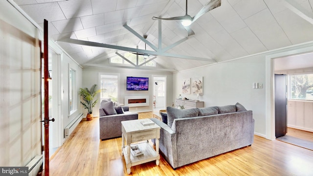 11951 Neale Sound Dr, Cobb Island, MD 20625 - living room with light wood finished floors, a baseboard heating unit, and vaulted ceiling with beams