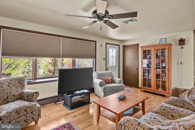 517 Monocacy Hl, Birdsboro, PA 19508 - living area featuring a baseboard heating unit, light wood finished floors, a ceiling fan, and visible vents