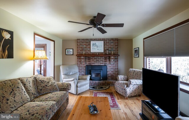 517 Monocacy Hl, Birdsboro, PA 19508 - living area featuring wood-type flooring, ceiling fan, and a fireplace