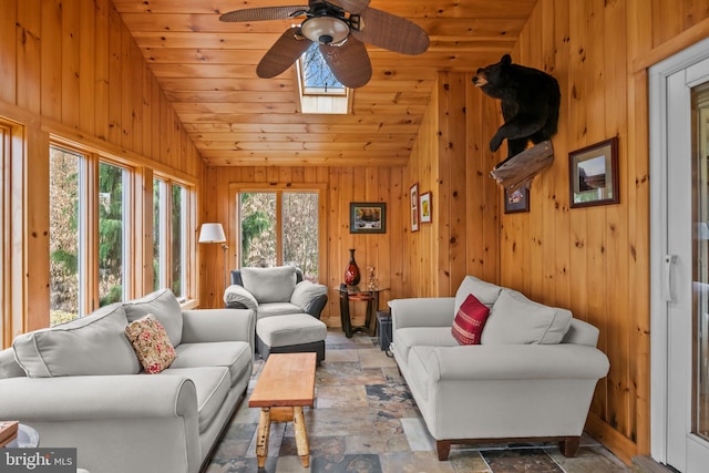 517 Monocacy Hl, Birdsboro, PA 19508 - living room featuring lofted ceiling, a wealth of natural light, and stone tile flooring