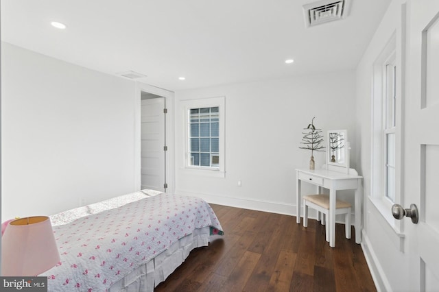 bedroom featuring baseboards, visible vents, recessed lighting, and wood-type flooring