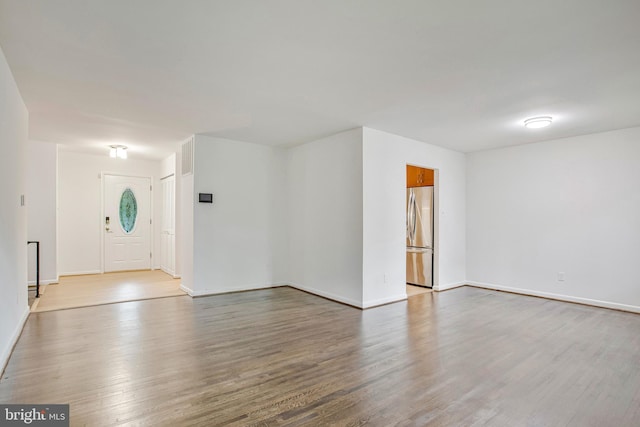 6901 Niles Dr, Laurel, MD 20707 - spare room featuring wood finished floors and baseboards