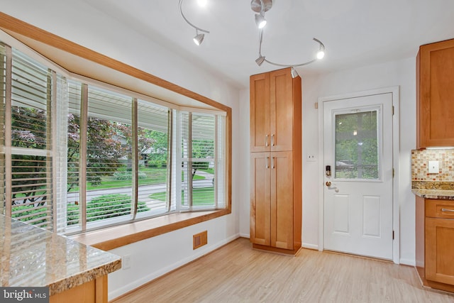 6901 Niles Dr, Laurel, MD 20707 - entryway featuring light wood-type flooring and baseboards