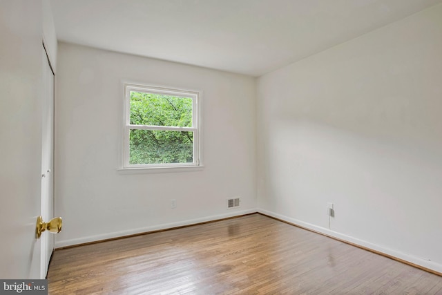6901 Niles Dr, Laurel, MD 20707 - unfurnished room featuring wood finished floors and baseboards