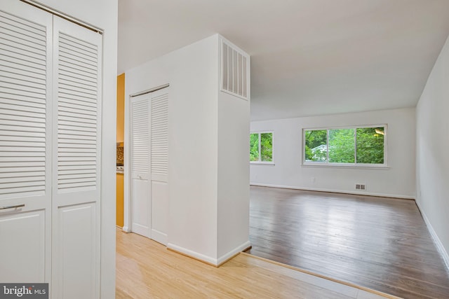6901 Niles Dr, Laurel, MD 20707 - hall featuring wood finished floors and baseboards