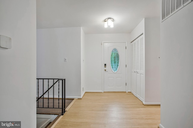 6901 Niles Dr, Laurel, MD 20707 - entrance foyer with wood finished floors and baseboards