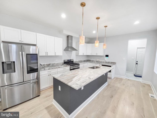 3906 Reisterstown Rd, Baltimore, MD 21215 - kitchen featuring stainless steel appliances, wall chimney range hood, a sink, white cabinetry, and recessed lighting